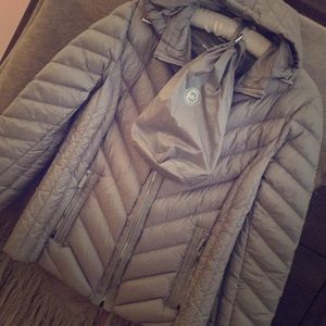 Brand new . Never worn Packable Michael Kors coat